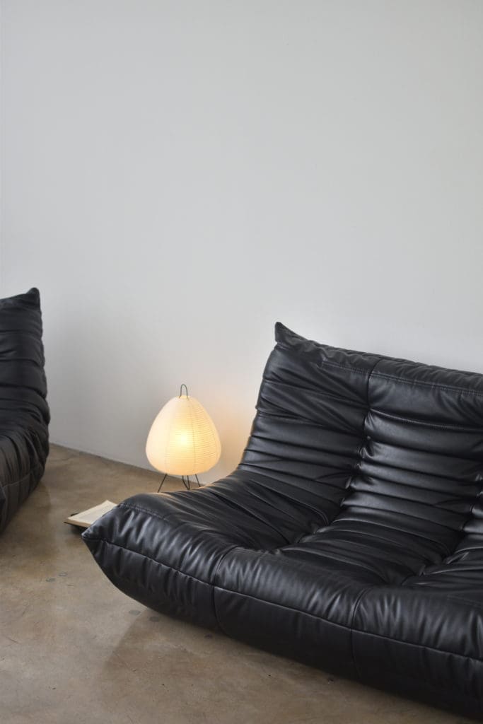 Black togo sofa - vitra akari floor lamp - ambient accent light - for small living room
